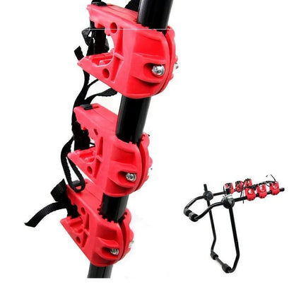 Black and red trunk mounted car bike holder rack with adjustable fastening system on vehicle boot