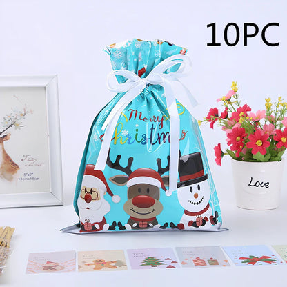 Christmas gift bag with drawstring closure in laser gold finish, 32x24cm dimensions