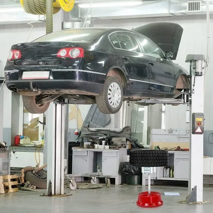 Portable hub balancer with aluminium head, bull's eye level, and 11.5" diameter base for wheel balancing