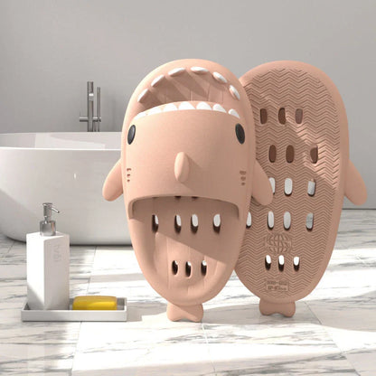 Colorful shark-themed shower slides with drainage holes, designed for comfortable and practical use in the pool or shower.