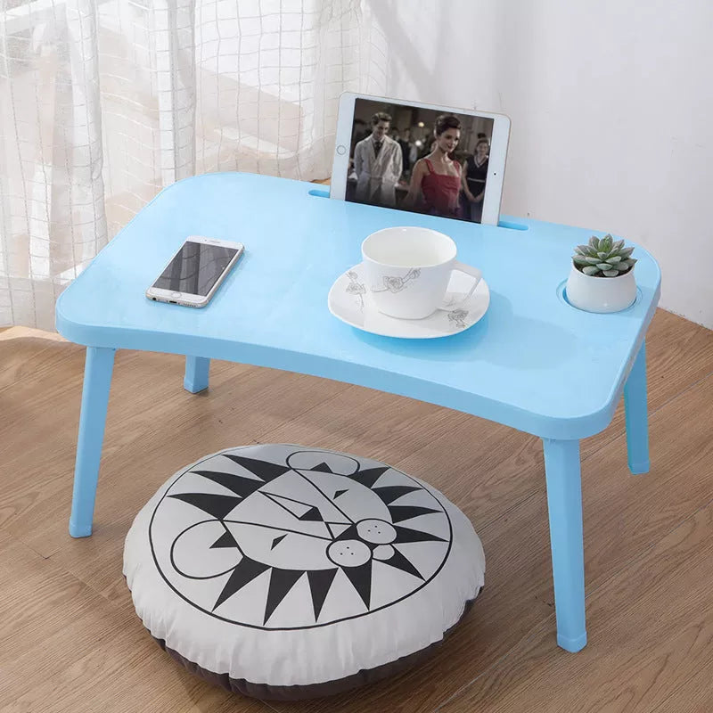 Foldable bed table in Nordic colors for portable computing