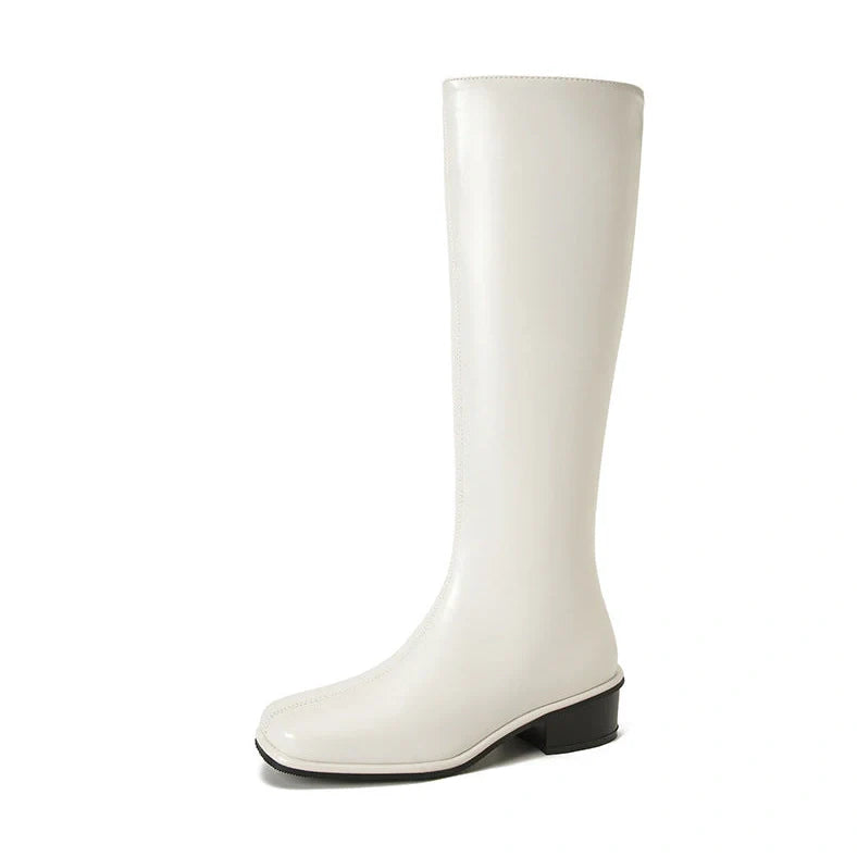 Black square toe over-the-knee boots with 4cm chunky heel showing leather interior and rubber sole