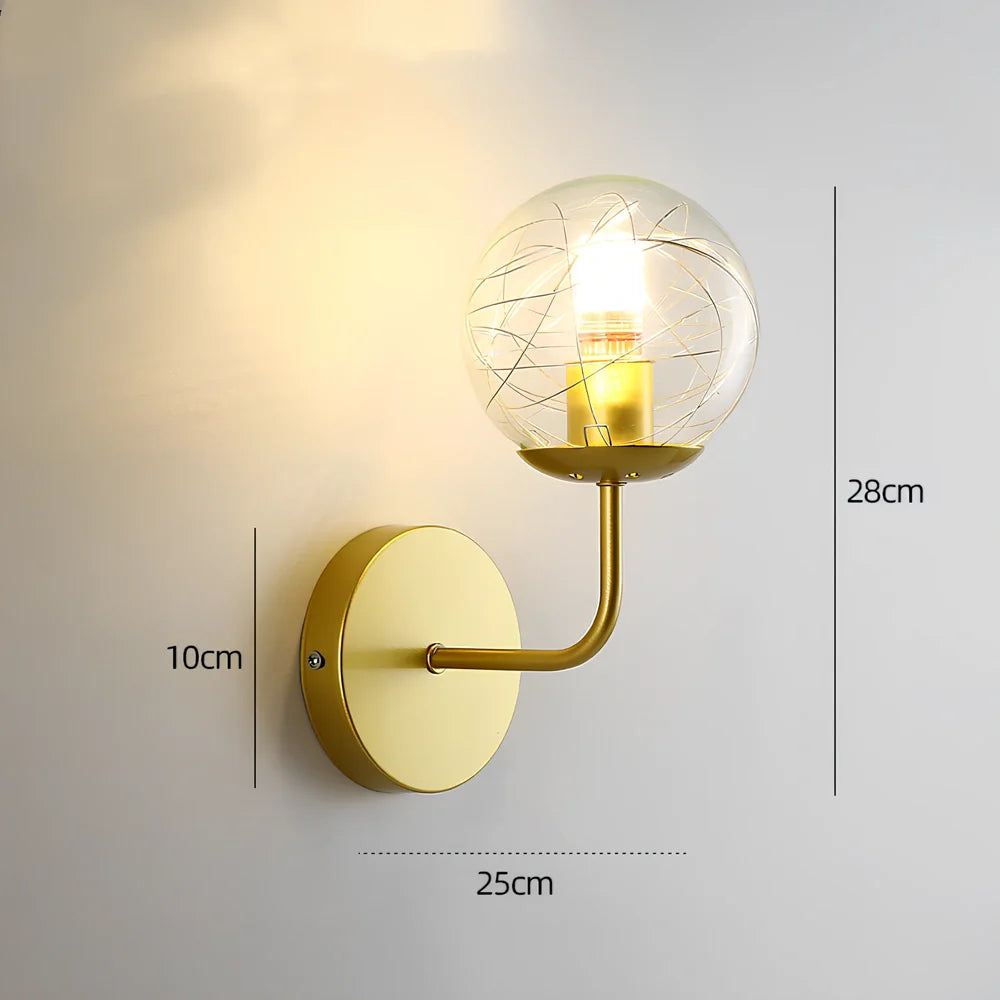 Crystal bedside lamp with stainless steel base and transparent shade providing soft illumination