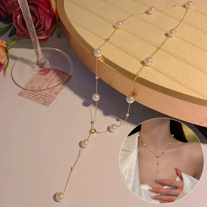 Starry Pearl Choker Necklace in gold and silver options, featuring imitation pearls and electroplated finish.