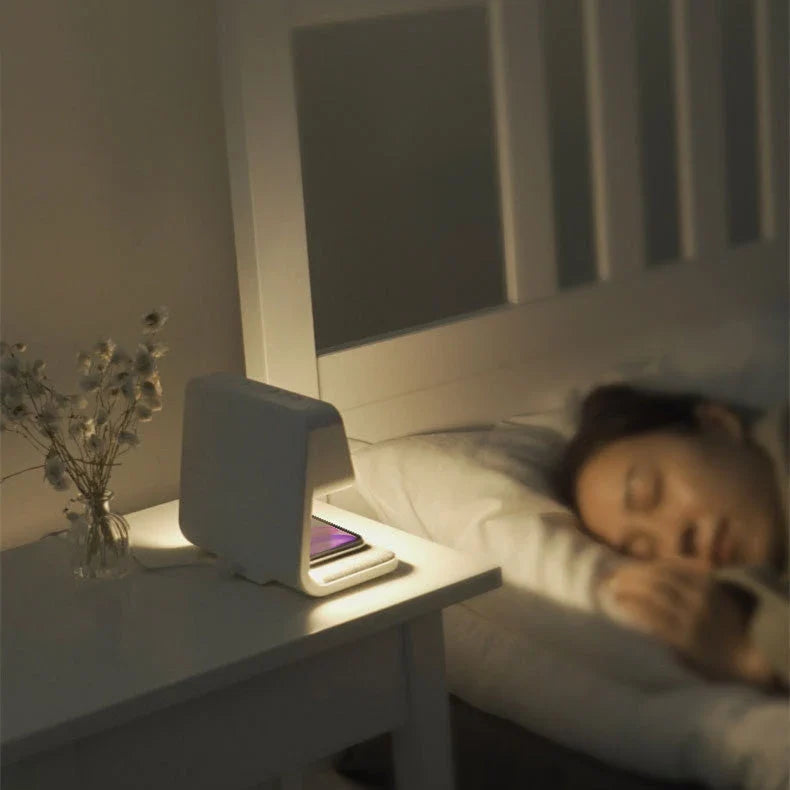 Versatile 3-in-1 bedside lamp with wireless charger, alarm clock, and adjustable LED lighting
