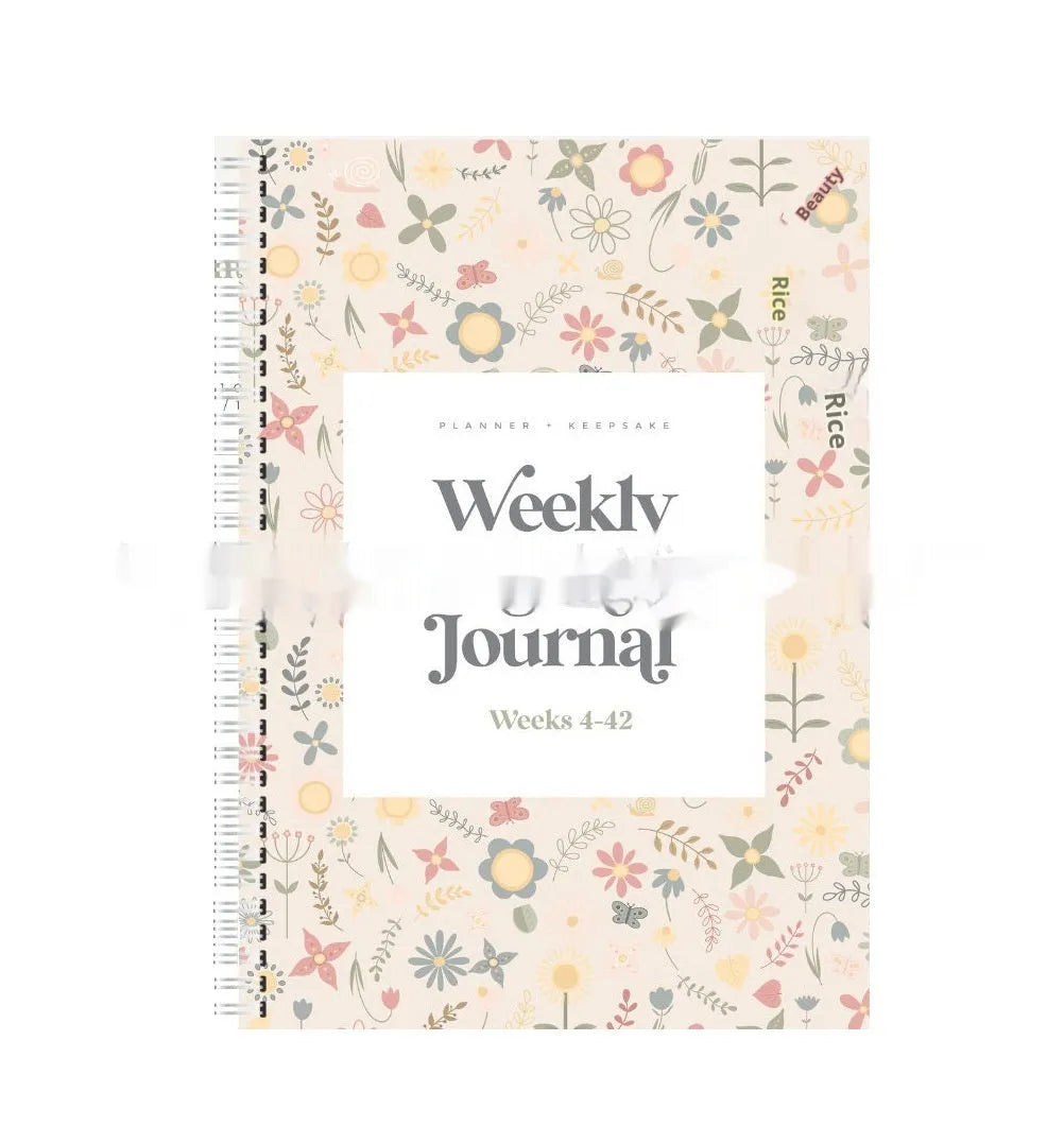 A5 Pregnancy Weekly Diary Notebook open to show weekly layout pages