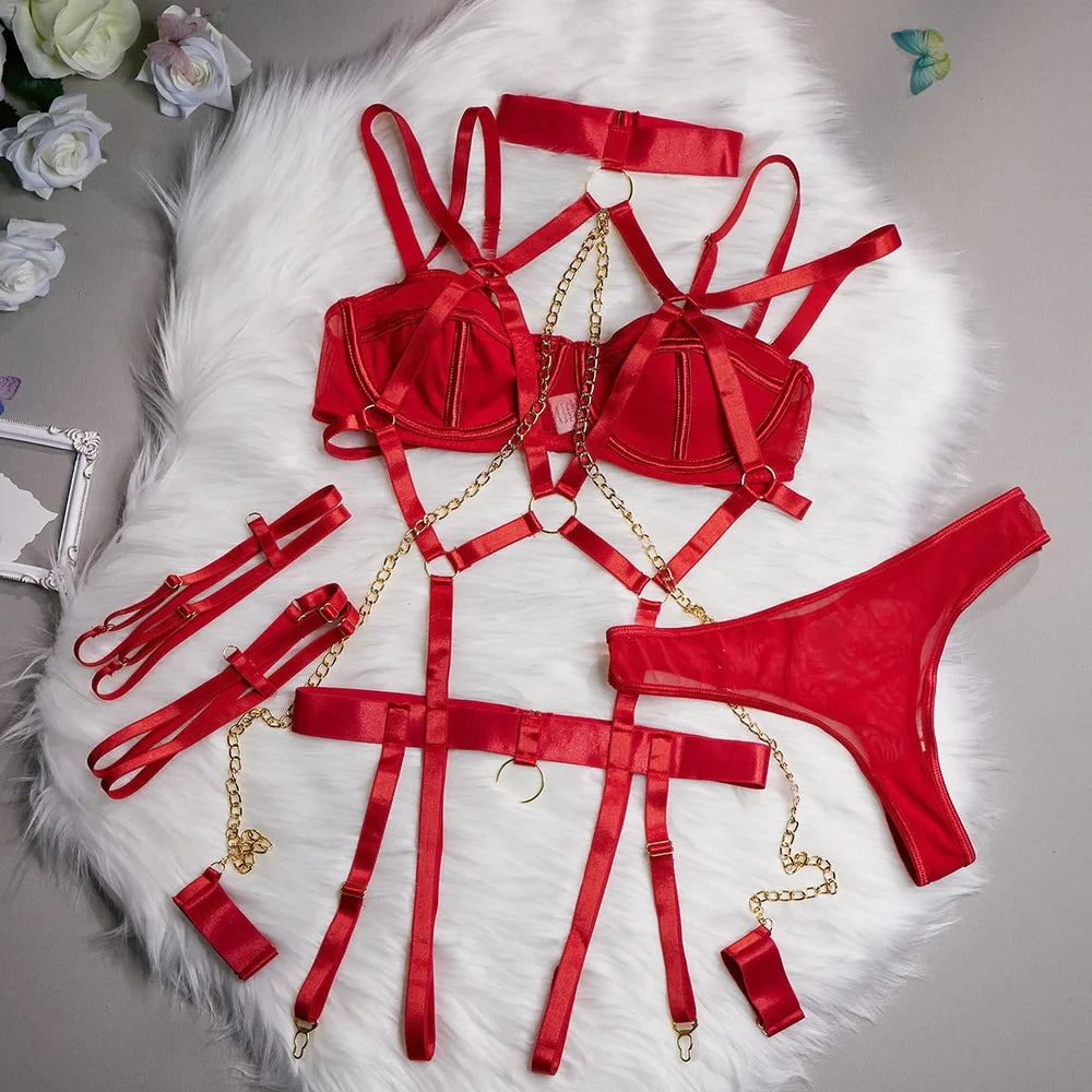 Women's black lingerie chain set with top, T-pants, two bracelets, and garter showing biker suit design