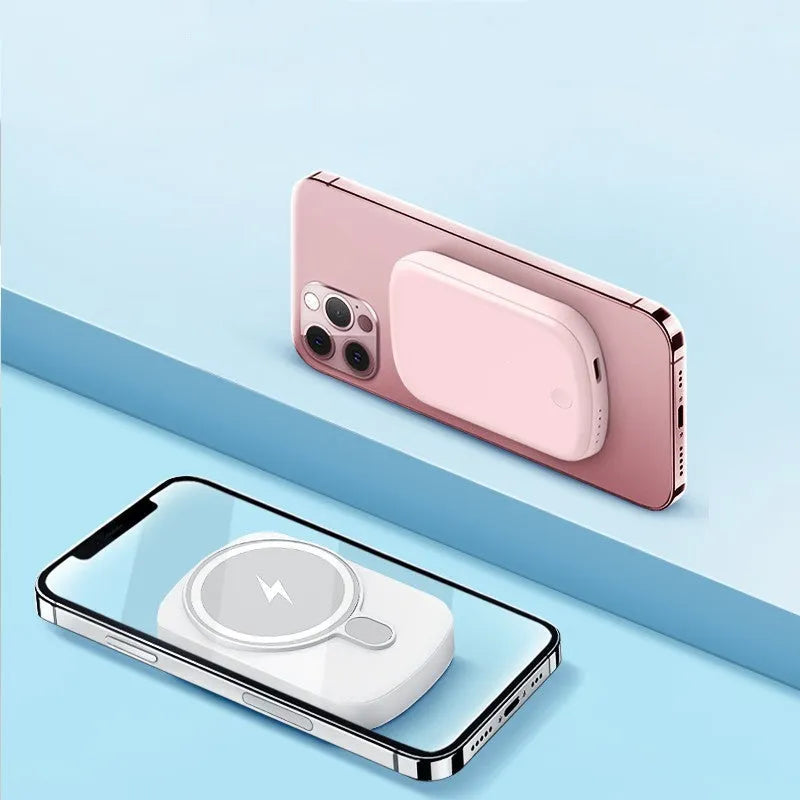 Magsafe magnetic wireless power bank in black, attached to an iPhone.