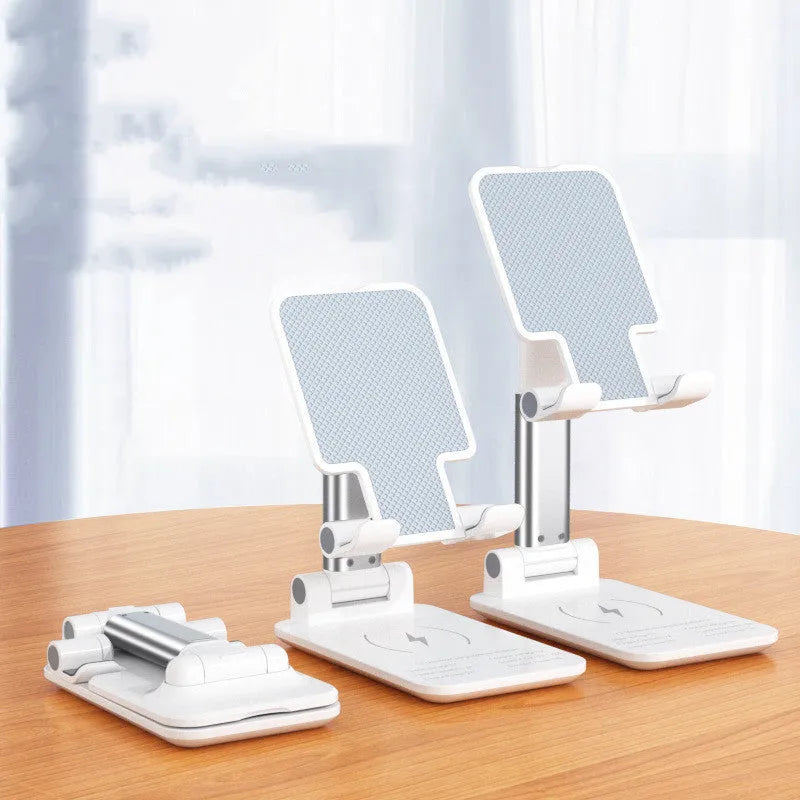 Black desktop wireless charging stand holding mobile phone at angle with power cord connected