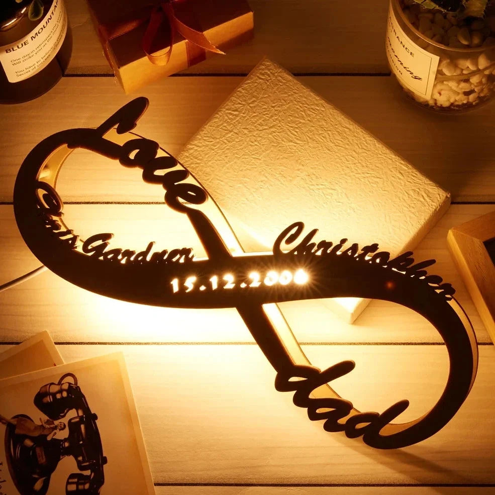 Wooden table lamp with custom name engraving showing modern simplicity design and push-button switch