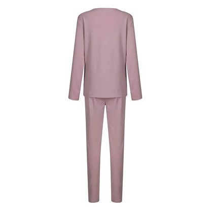 Cozy two-piece loungewear set with crew-neck sweater top and drawstring pants in pink, grey, and navy blue colors