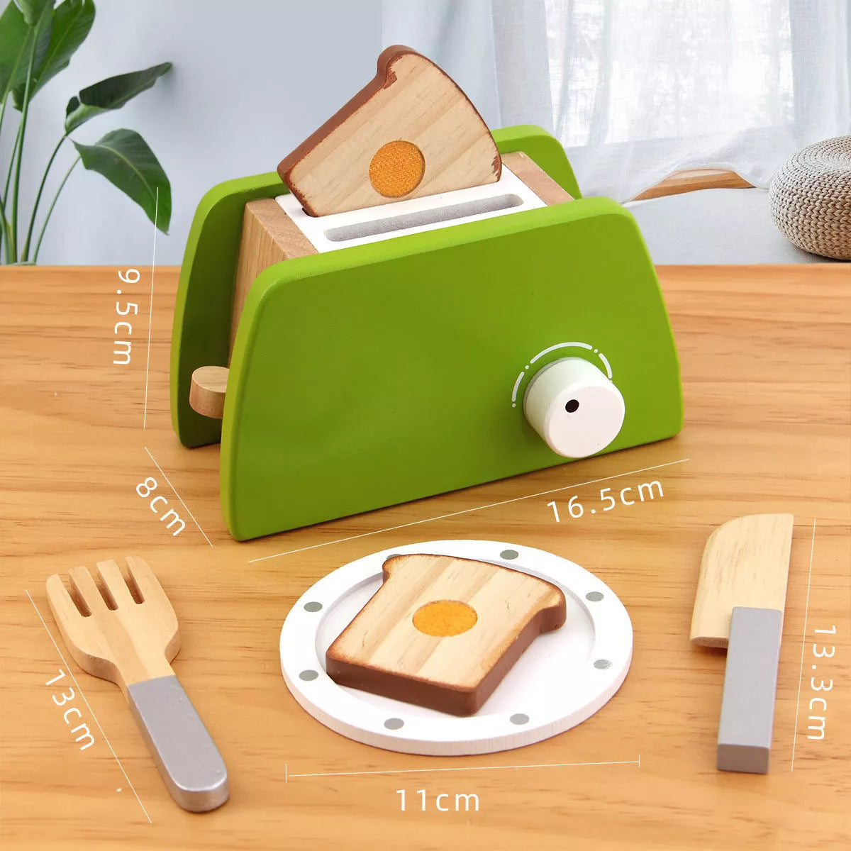 Wooden children's playhouse toys with Maca Dragon design, including kitchen-themed pieces for imaginative play