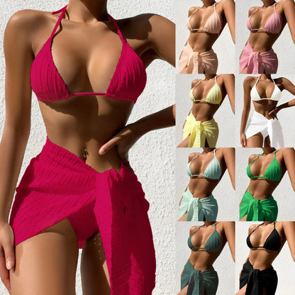 Women's halterneck bikini set with backless top and mesh skirt in a solid colour.