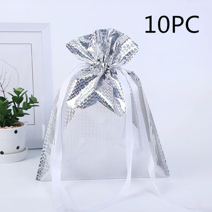 Christmas gift bag with drawstring closure in laser gold finish, 32x24cm dimensions
