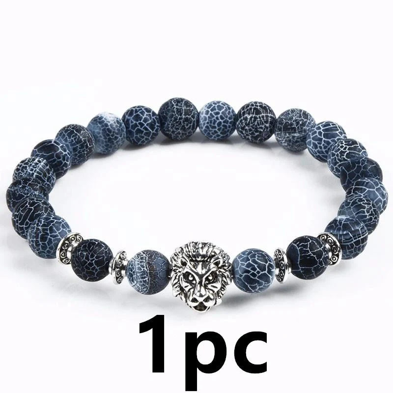 Carved stone bracelet featuring a powerful lion design, meant to enhance confidence and style.