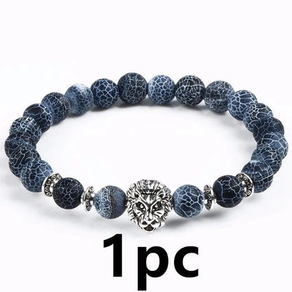 Carved stone bracelet featuring a powerful lion design, meant to enhance confidence and style.