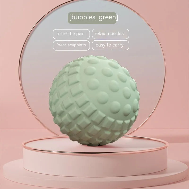A 6cm diameter pink TPR foot massage ball on a plain background.