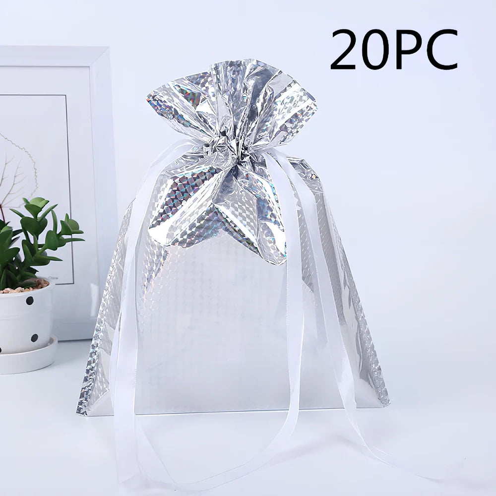 Christmas gift bag with drawstring closure in laser gold finish, 32x24cm dimensions
