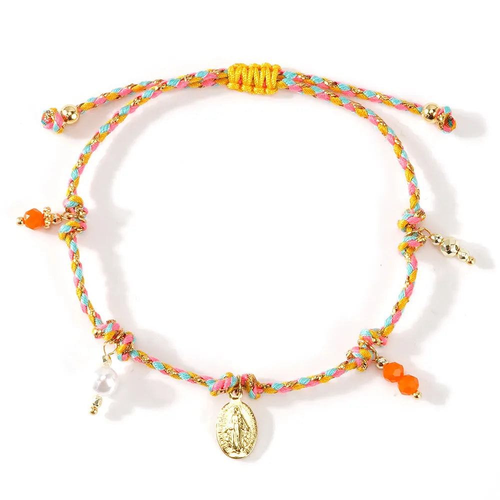 Close-up of a colourful hand-woven braided rope bracelet for women, showing ethnic strap design.