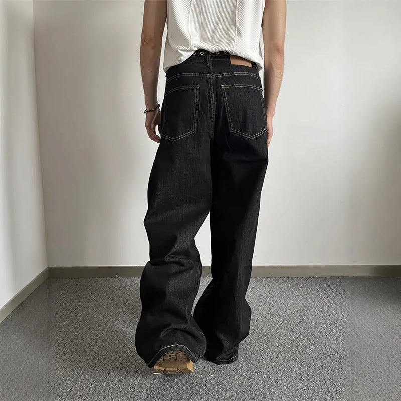 Retro men's loose wide-leg jeans in black denim with straight leg cut and mid-waist design for everyday casual wear, available in sizes S to 3XL with zip fly placket