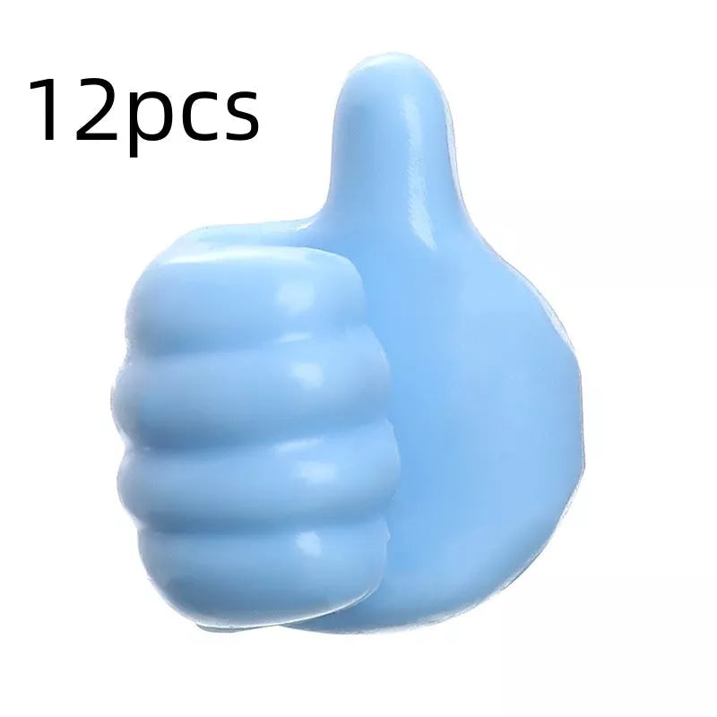 Silicone thumb wall hooks in various colors for organizing kitchen and bathroom items