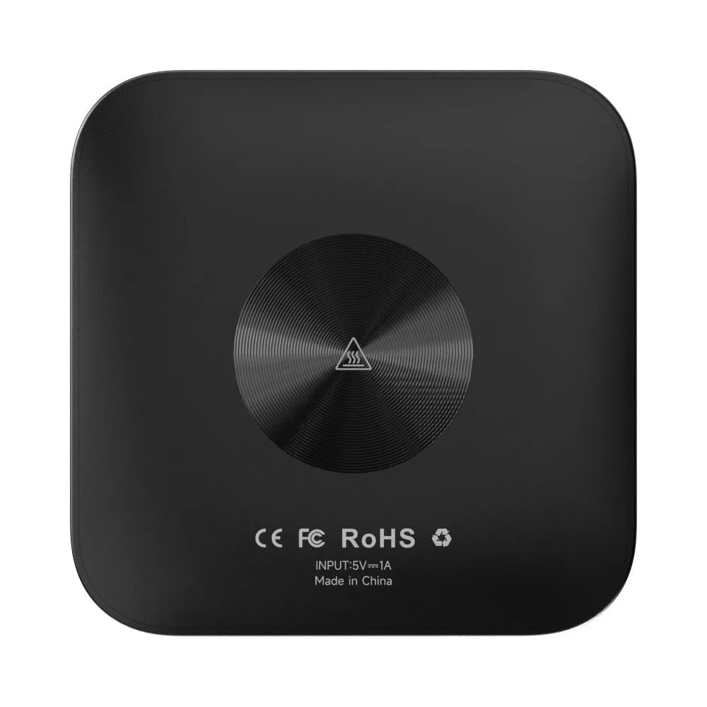 Square-shaped wireless CarPlay adapter box for cars with Android 13 system.