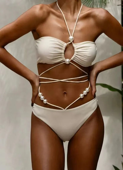 Women's black lace-up split bikini swimsuit with adjustable front and matching briefs
