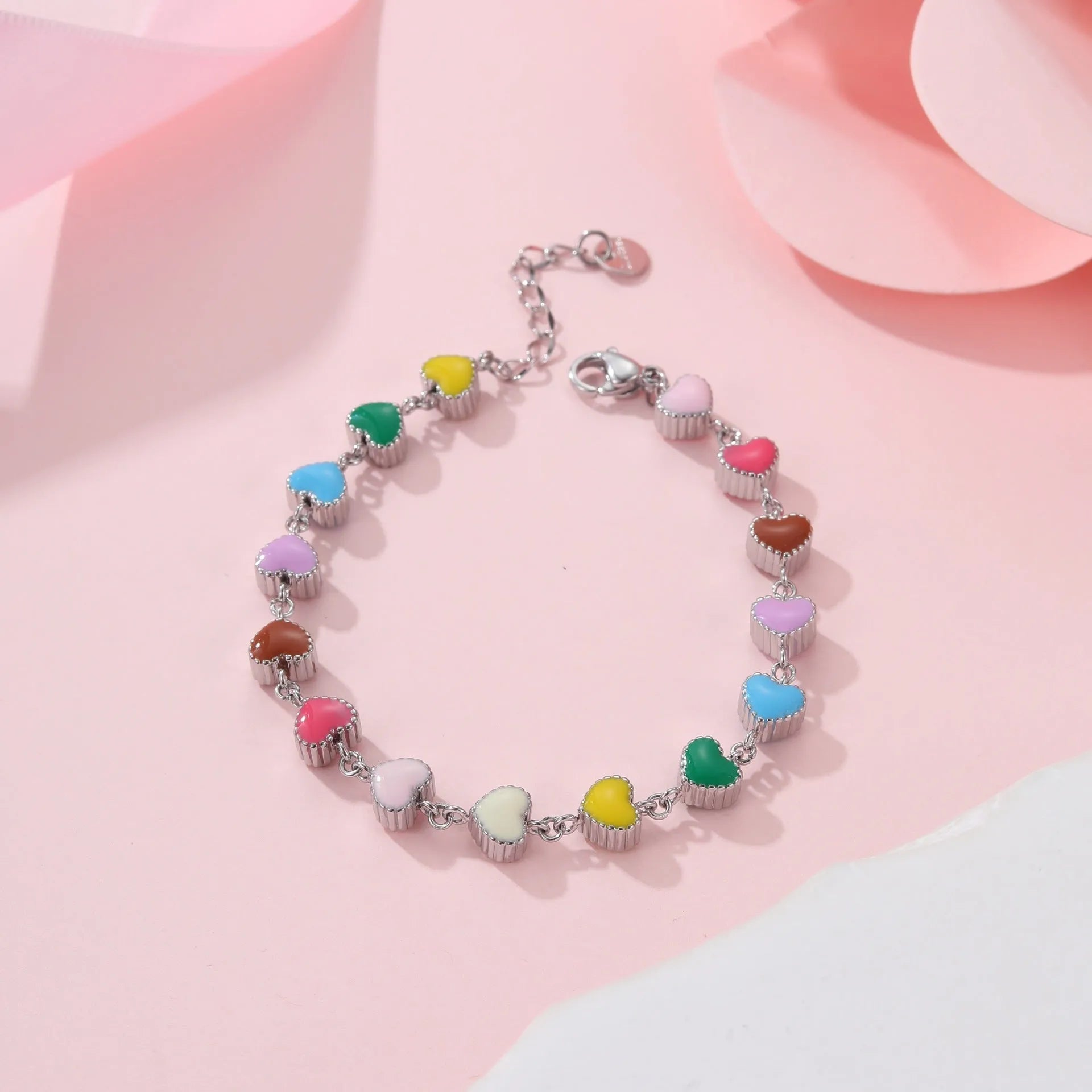 Women's heart-shaped titanium steel bracelet with electroplated finish in gold or steel colour options
