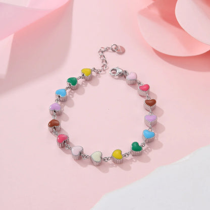 Women's heart-shaped titanium steel bracelet with electroplated finish in gold or steel colour options