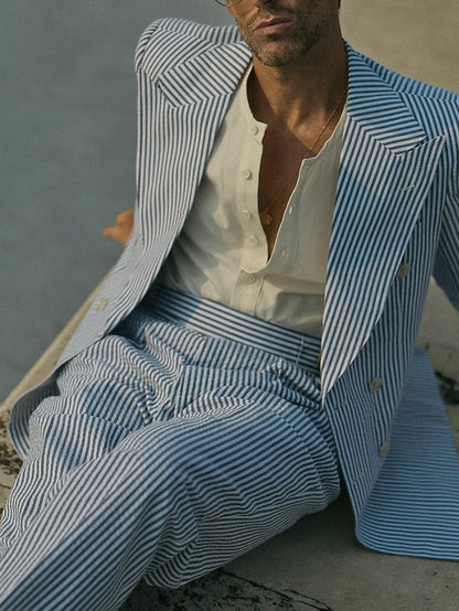 Blue and white striped polyester suit set with blazer and pants on mannequin