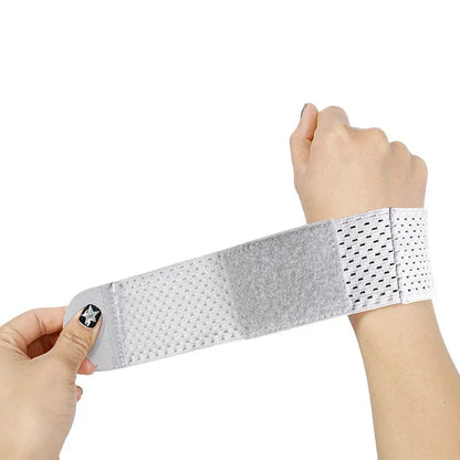 High elastic breathability athletic wristguard in black, grey, or pink colour for sports wrist support.