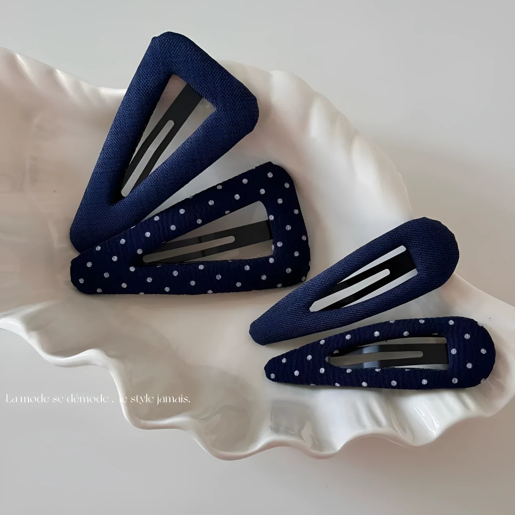 French retro dot pattern barrettes in triangle and water drop shapes with dark denim styling