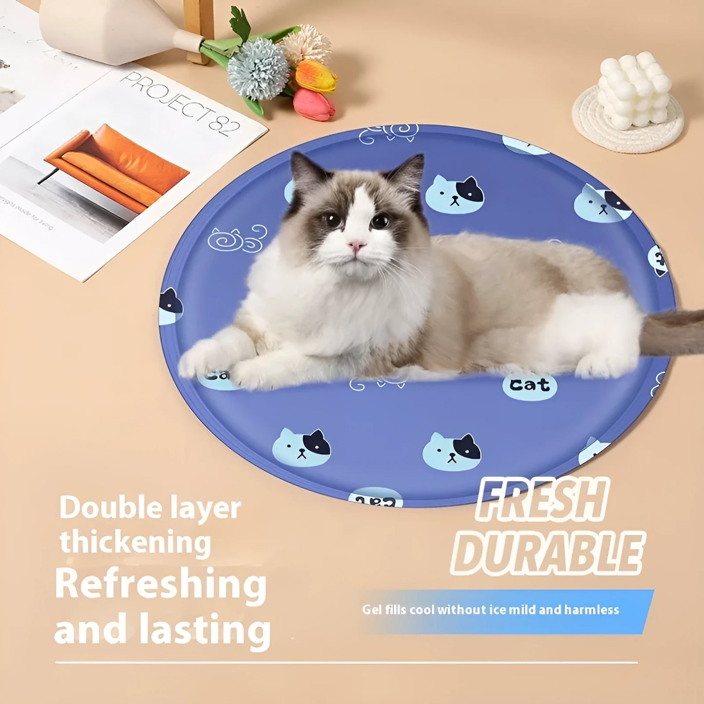 Round pet cooling mat with cartoon dog designs in blue and beige colour options