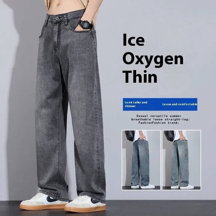 Straight-leg casual trousers in thin denim fabric with zip fly placket, available in UK2560 blue, grey, light blue, and vintage blue colours