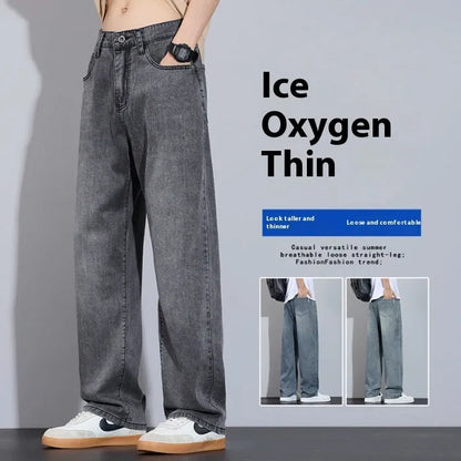 Straight-leg casual trousers in thin denim fabric with zip fly placket, available in UK2560 blue, grey, light blue, and vintage blue colours