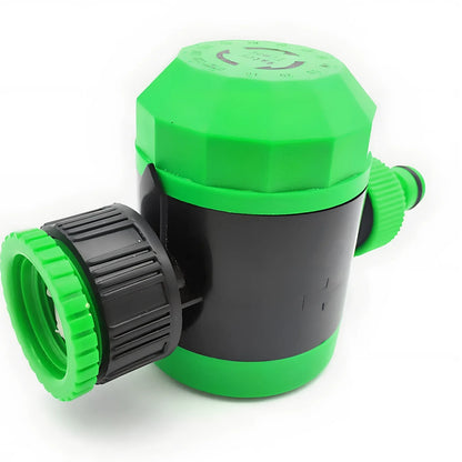 Plastic mechanical garden irrigation timer, 140mm size, connected to outdoor faucet with hose, showing 120-minute dial and auto shut-off feature
