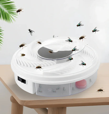 USB electric fly trap in white with blue accents, showing five bait grooves and rotating capture plate for insect control