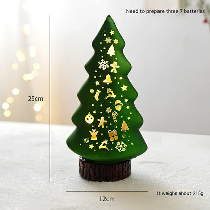 Glass Christmas desktop decoration showing tree, cone, and cup designs in various colours