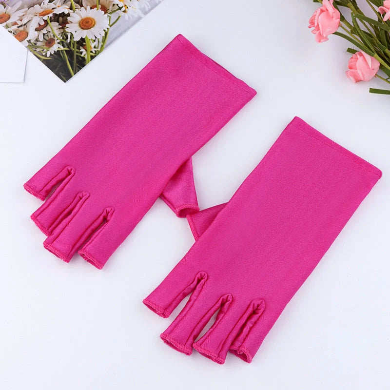 Manicure gloves with UV protection, featuring a stylish half-finger design and hand-painted finish for a comfortable and functional at-home nail care experience.