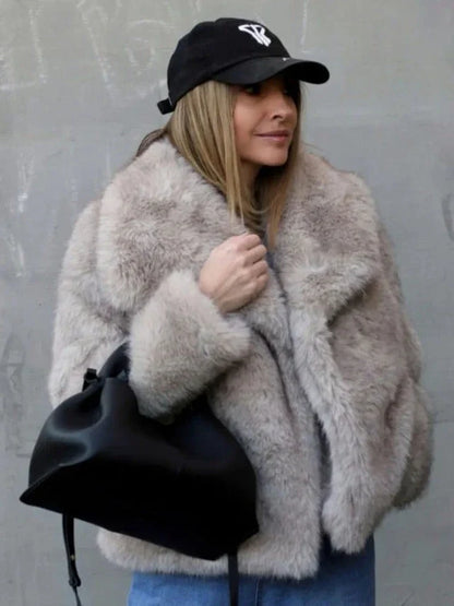 A warm and stylish plush coat for women, available in a variety of colors and sizes.