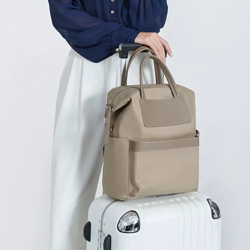 Women's lightweight waterproof backpack with hand-hold design in khaki and black