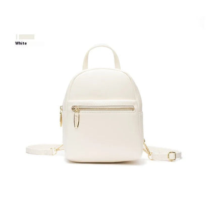 Soft PU mini backpack in multiple colours showing three-dimensional outer pockets and street style design.