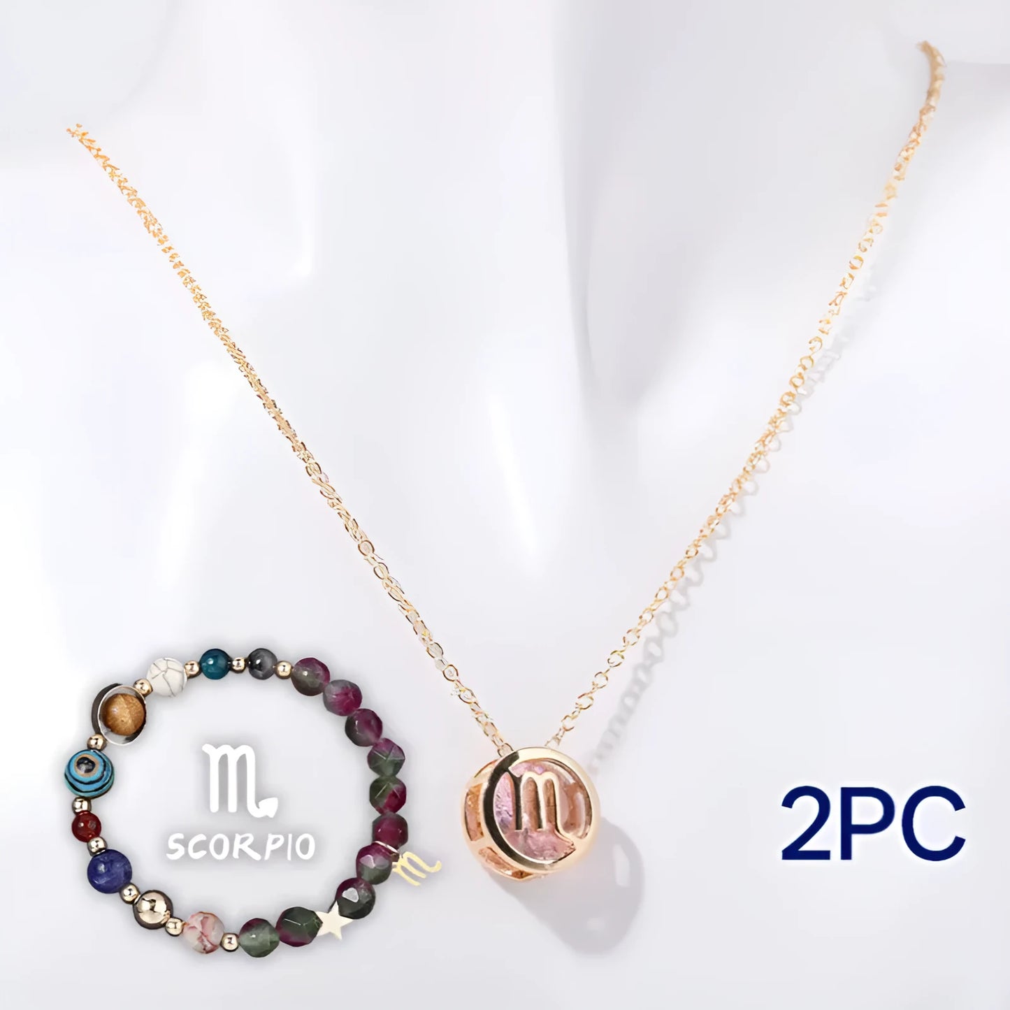 Natural stone beaded necklace and bracelet set laid out flat, showing the coordinated design and textured beads.