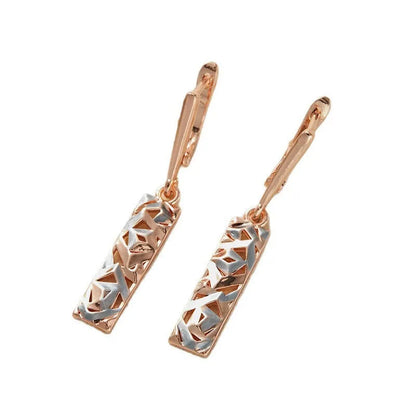 Rectangular two-tone hollow stud earrings with a geometric design and electroplated finish.