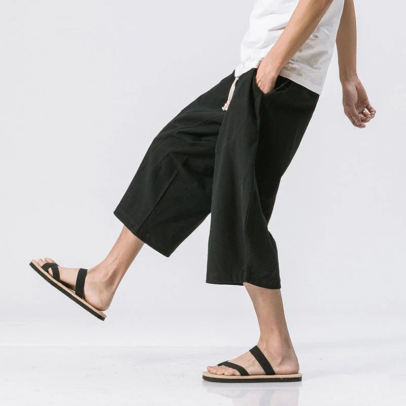 Comfy cotton harem pants in a variety of colors, featuring a relaxed, wide-leg silhouette and convenient drawstring waistband.
