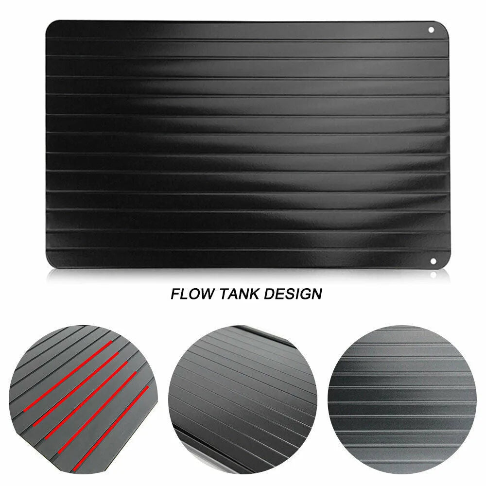 Black aluminium fast defrosting tray for thawing frozen food on kitchen counter