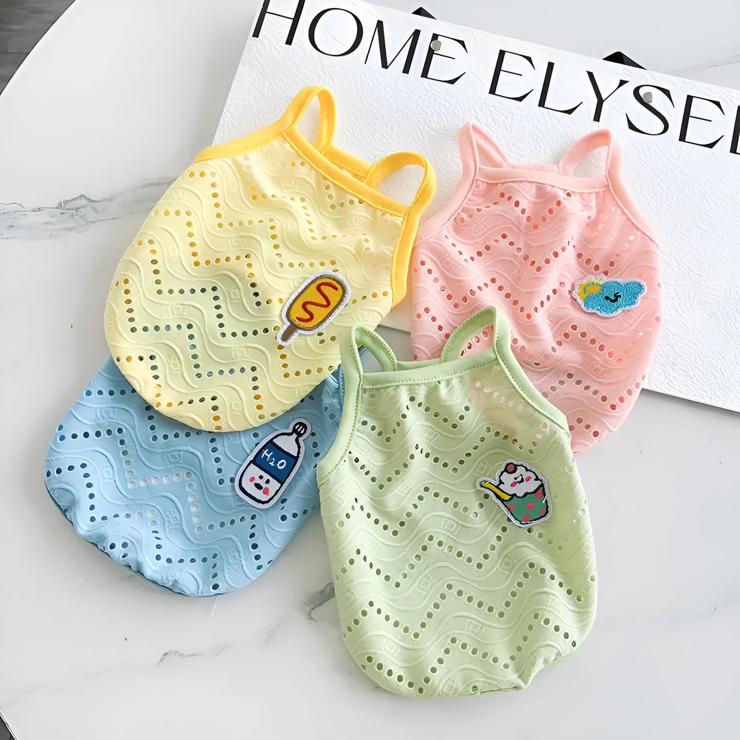 Pet vest with mesh straps in blue milk bottle colour showing camisole-style polyester construction