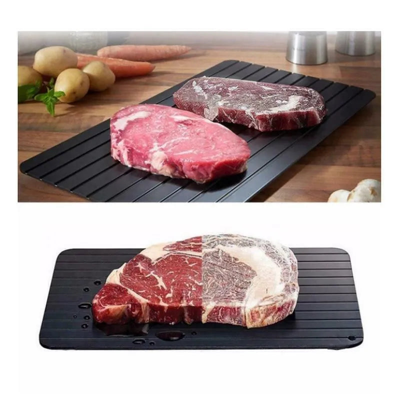 Black aluminium fast defrosting tray for thawing frozen food on kitchen counter