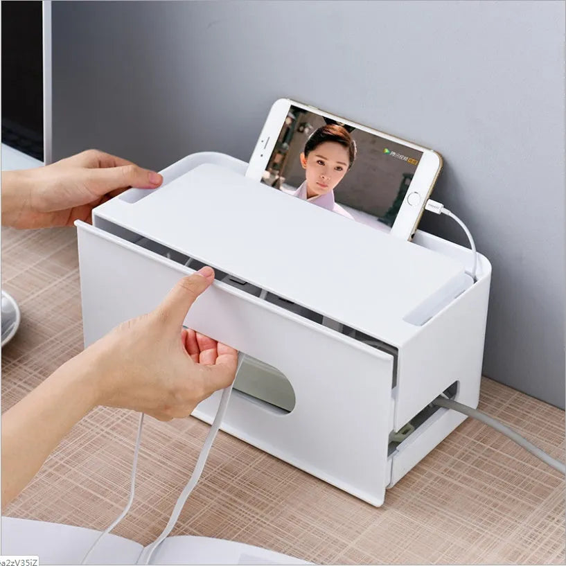 Grey and white plastic wireless router storage box with cable management compartment
