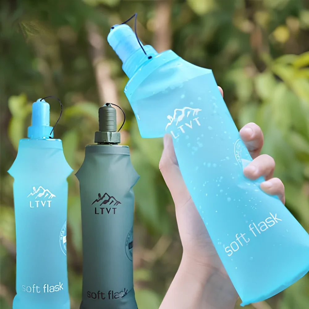 Sky blue folding TPU sports water bottle, 500ml capacity, leak-proof cap, collapsed view for portability